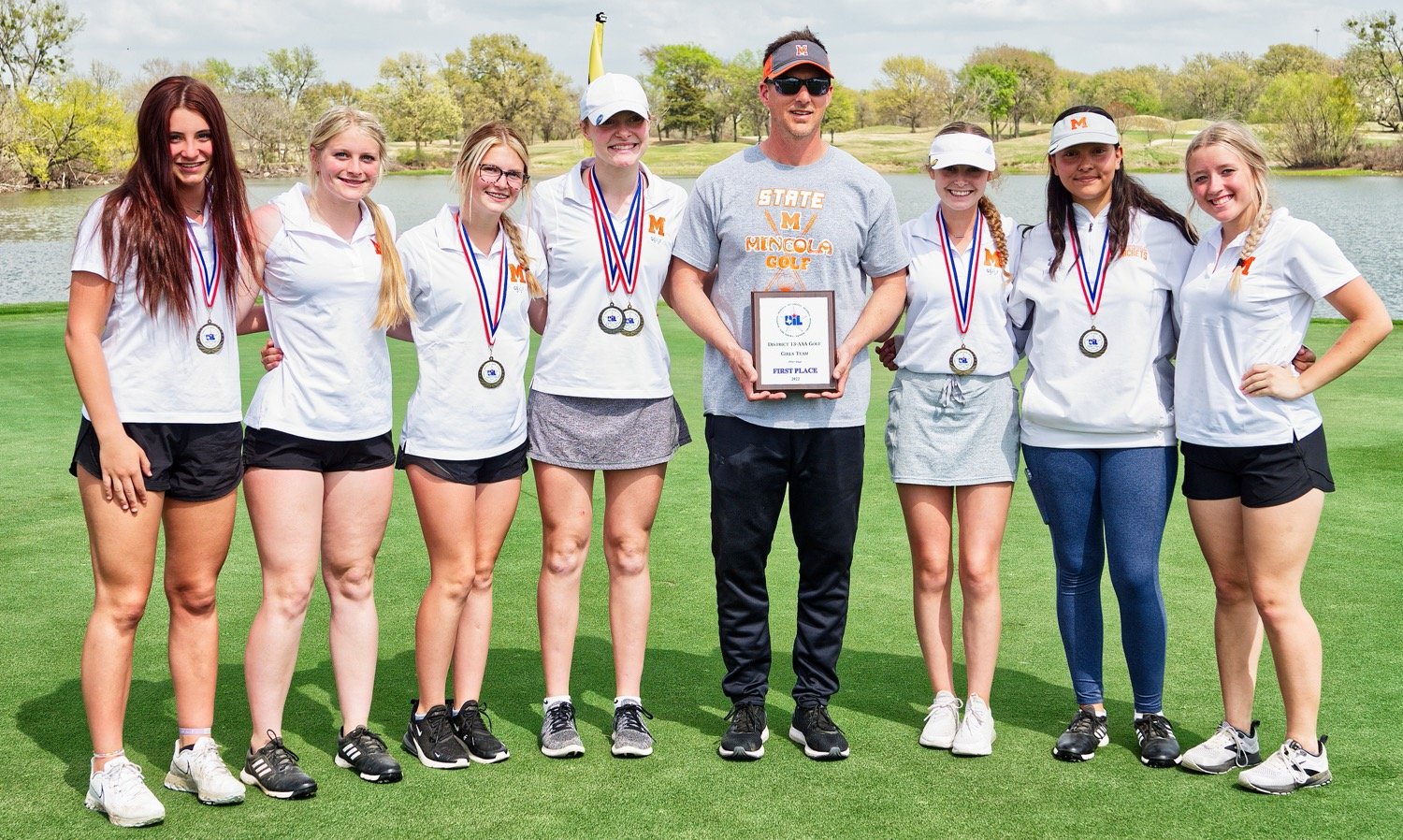The Mineola girls golf team earned a repeat trip to the regional golf tournament after winning the district championship Monday in Sulphur Springs. They include, from left, Valerie Moreland, Ramsey Anderson, Bransyn Anderson, Ava Johnson, Coach Ryan Steadman, Sunni Ruffin, Savannah Lopez and Sarah Smith. They will be vying to return to the state tournament for the second straight year April 20 at Oakhurst in Bullard. [see some swings]